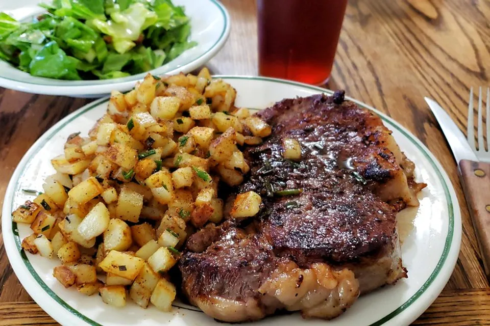 pan fried rib eye and hash browns